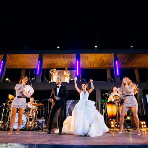 bride and groom on stage with wedding band big day showband