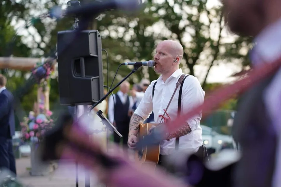 Andy Brohemian performing at outdoor event