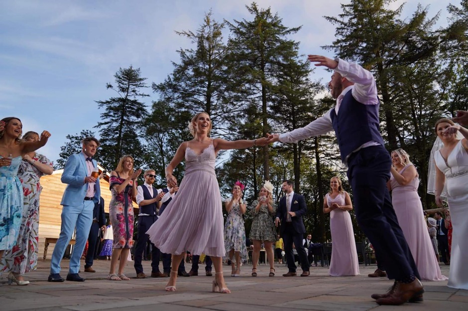 Cople dancing at outdoor event